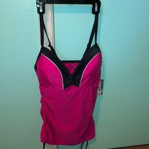 Woman’s size medium pink and gray swim top